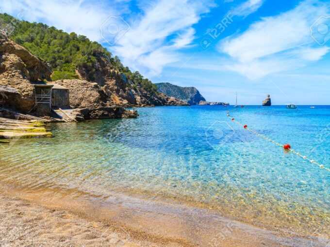 View Of Cala Benirras Beach With Azure Blue Sea Water, Ibiza Island, Spain